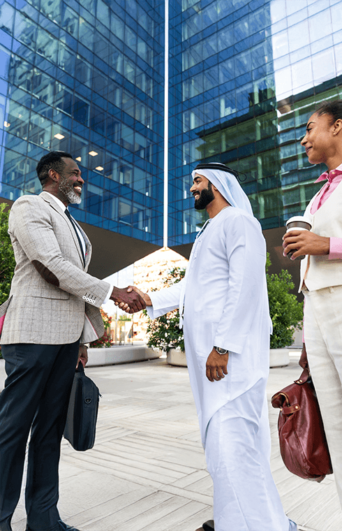 Business professionals shaking hands